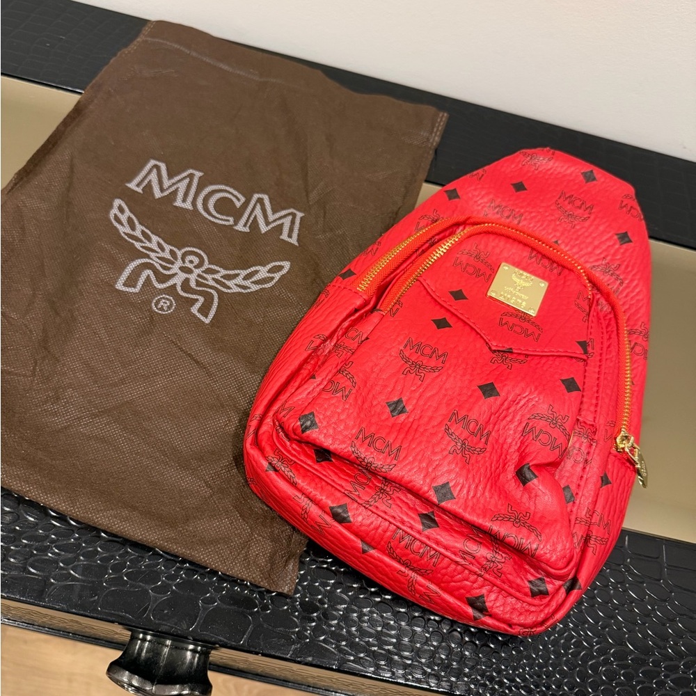 MCM Vibrant Red Backpack with Gold Accents